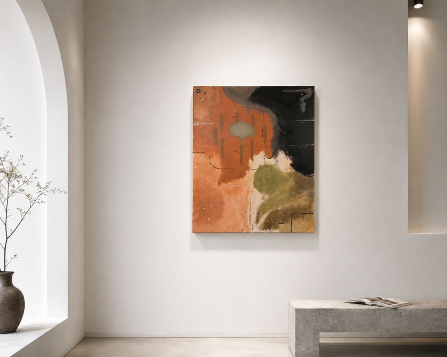 Torment hanging in a white gallery alcove, warm downlight from above, a dried branch in a stone vase to the left.